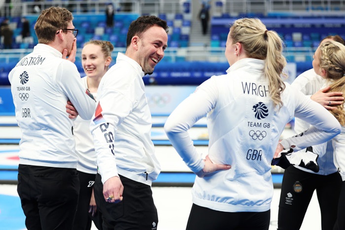 David Murdoch in Beijing celebrating with women's curling team