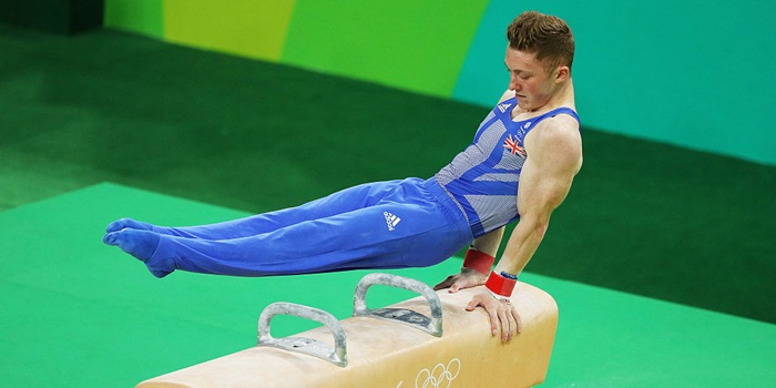 Gymnast competing on pomel