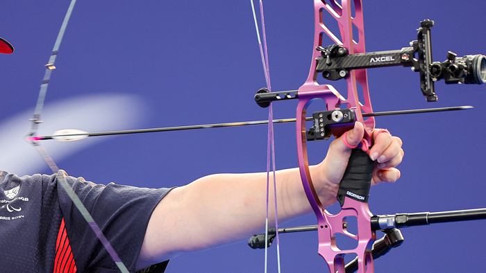 A close crop image of Phoebe Paterson Pine taking part in the Para Archery Competition at the Paris 2024 Paralympic Games.