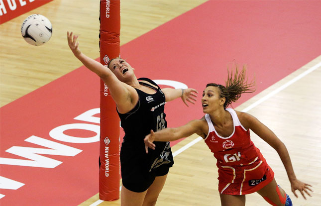 Athletes playing netball