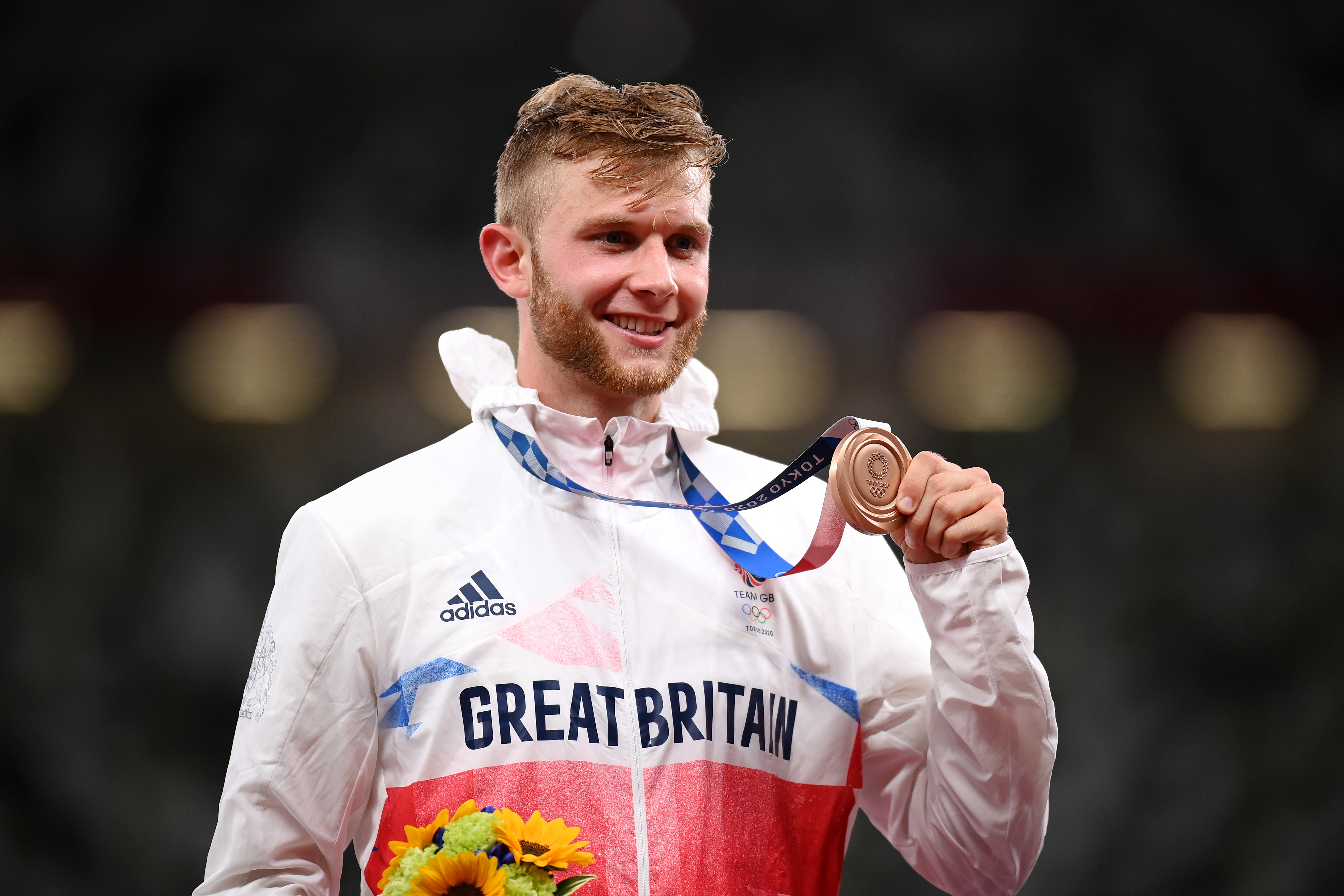 Josh Kerr with his bronze medal at Tokyo 2020