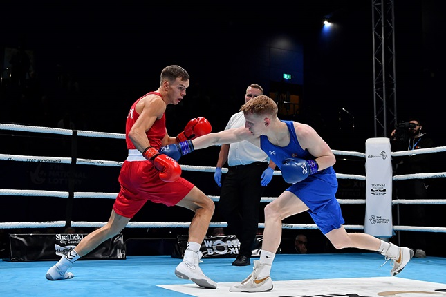 Lewis Richardson dodges a jab from his opponent whilst boxing at the World Boxing Cup - Sheffield 2023