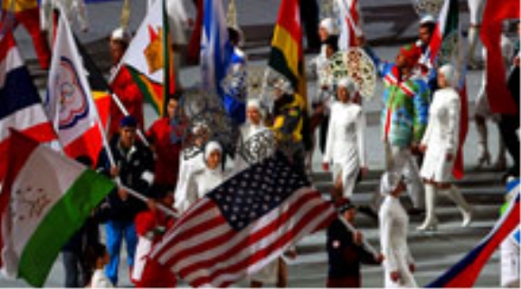 A display of international flags being carried by athletes at the opening ceremony of the Olympic Games