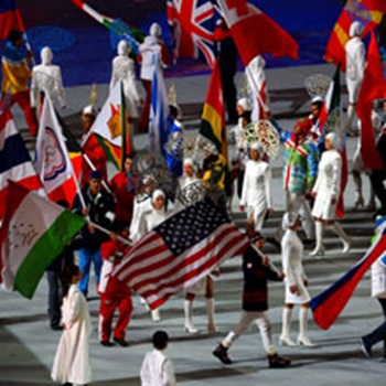 A display of international flags being carried by athletes at the opening ceremony of the Olympic Games