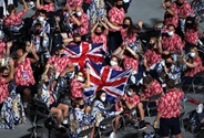ParalympicsGB holding the GB flag at the closing ceremony