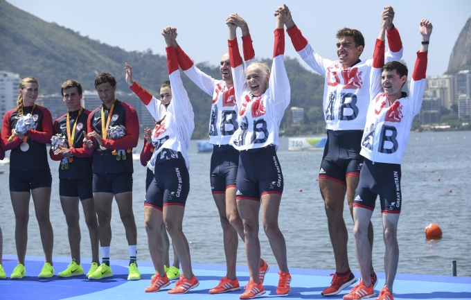 Para rowing athletes celebrate winning a medal at Rio 2016