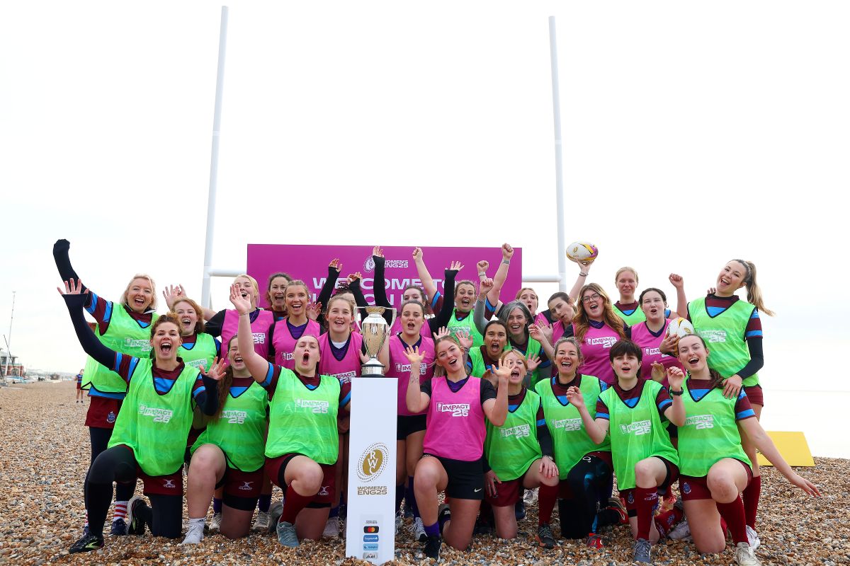 Community rugby players pose for a photo during the Women's Rugby World Cup 2025 in Brighton, England