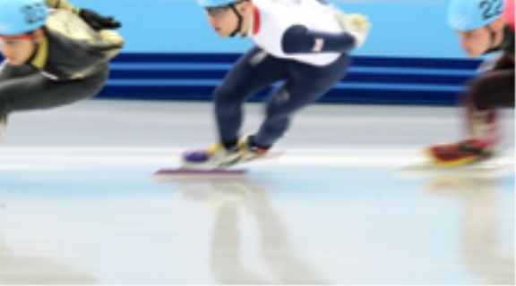 British short track speed skater in action