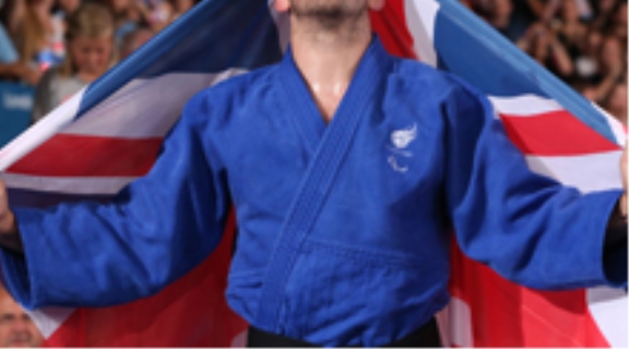 VI Judo athlete celebrates a win 
