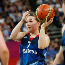 A British wheelchair basketball athlete lines up a shot