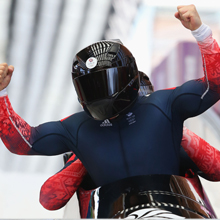 Bobsleigh athletes celebrate