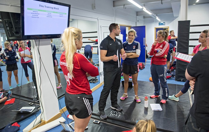 Group of people stood in gym