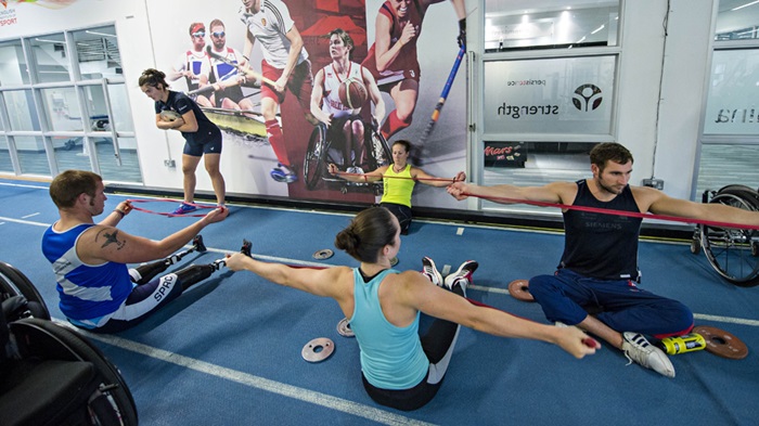 Group of people training in a gym