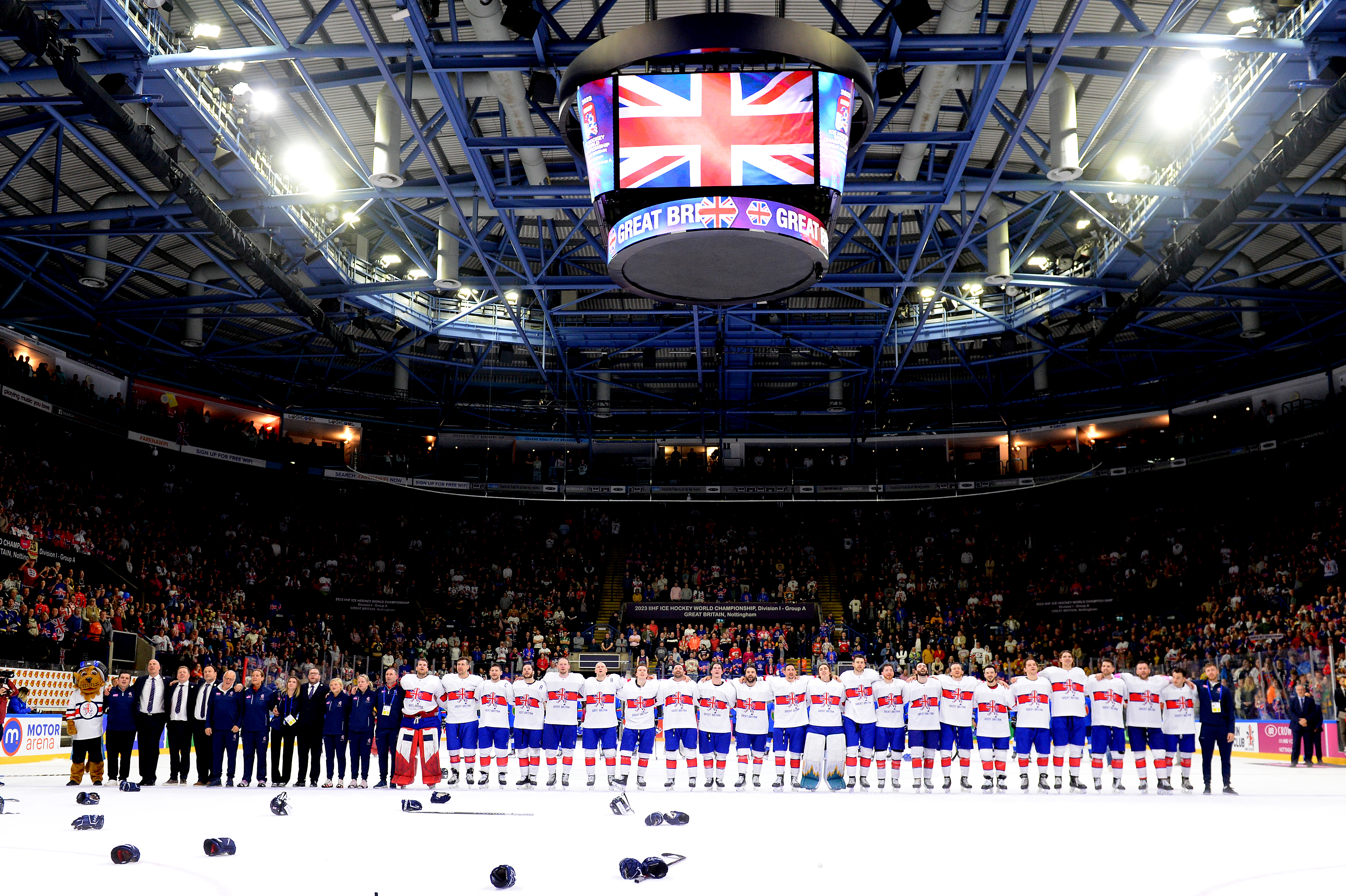 GB Ice Hockey Team stood in a line in the middle of the ice rink before a match