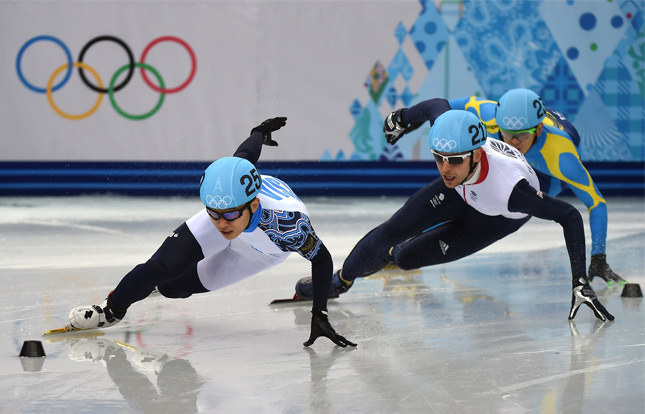 Athletes competing in short track speed skating