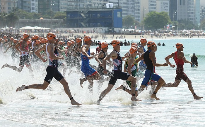 Athletes at the start of a swim race