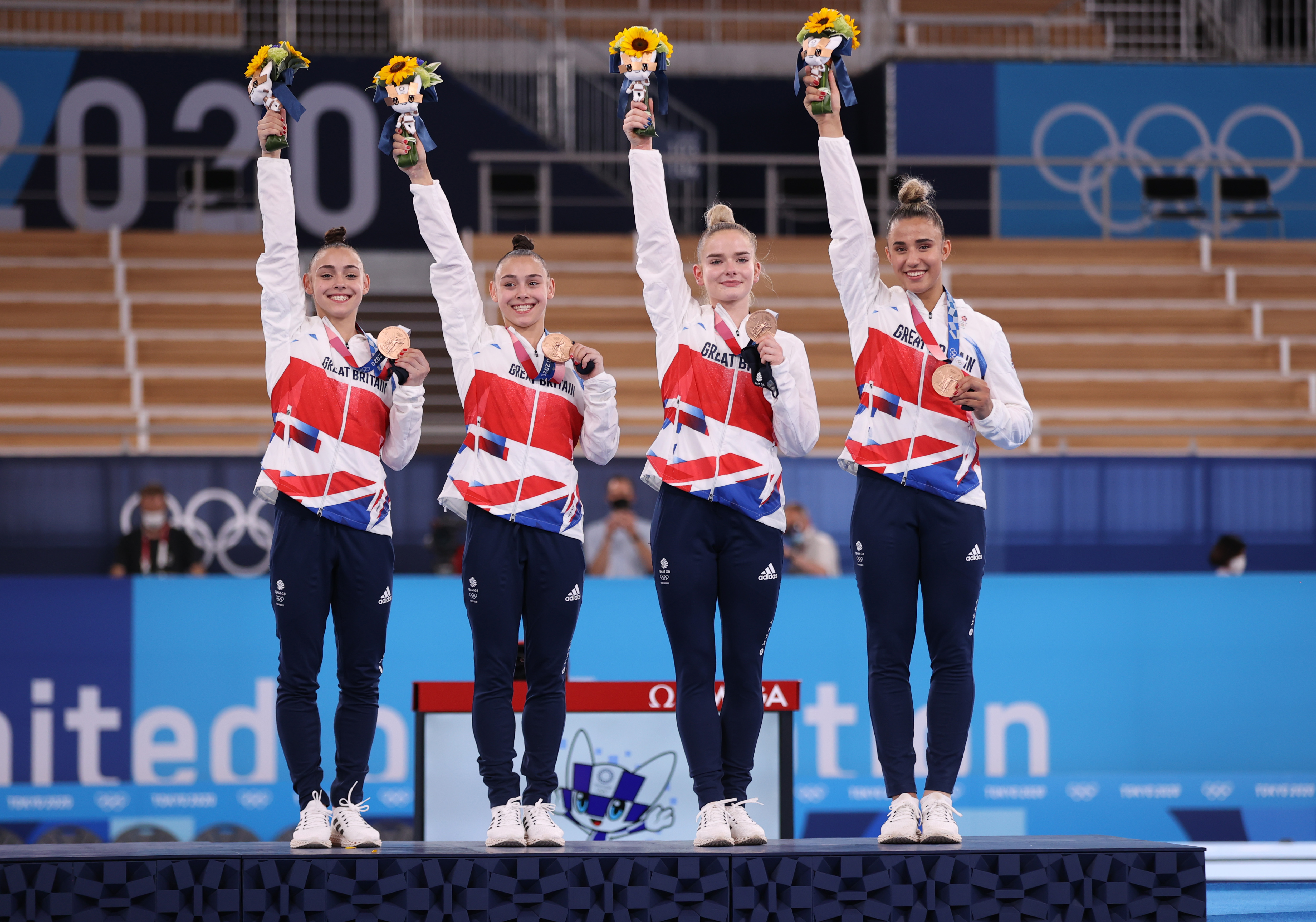The women's gymnastics team celebrate at Tokyo 2020