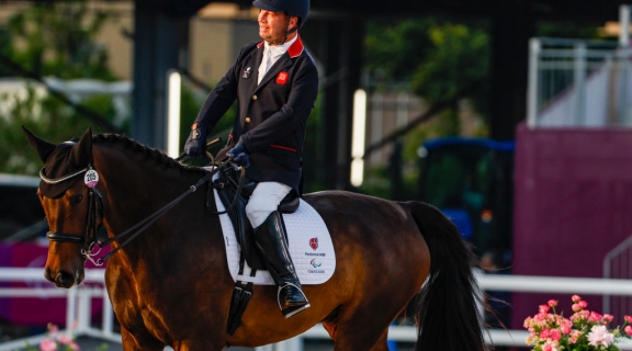 Lee Pearson competing at Tokyo Paralympic Games in equestrian