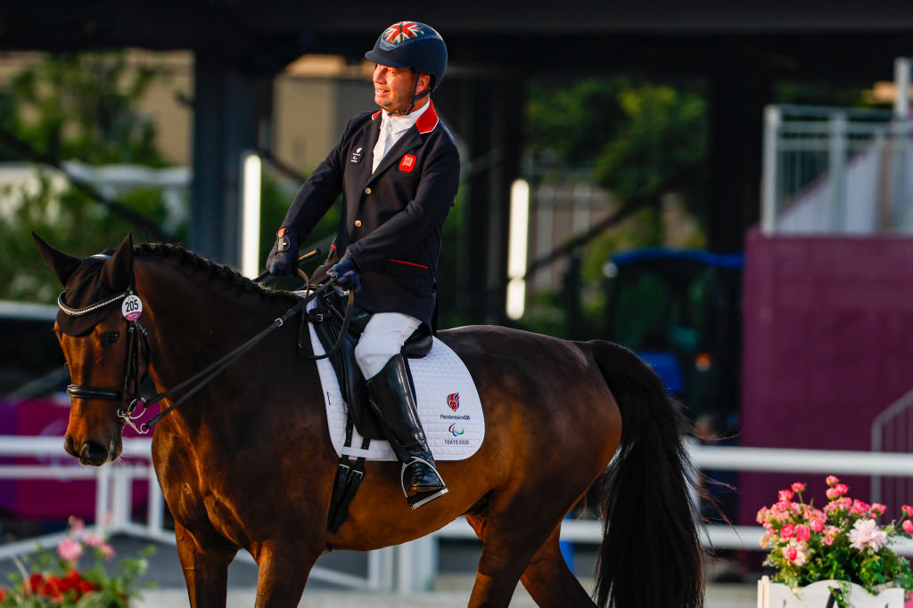 Lee Pearson competing at Tokyo Paralympic Games in equestrian