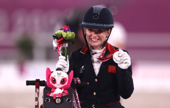 natasha Baker celebrating her equestrian Paralympic medal at Tokyo