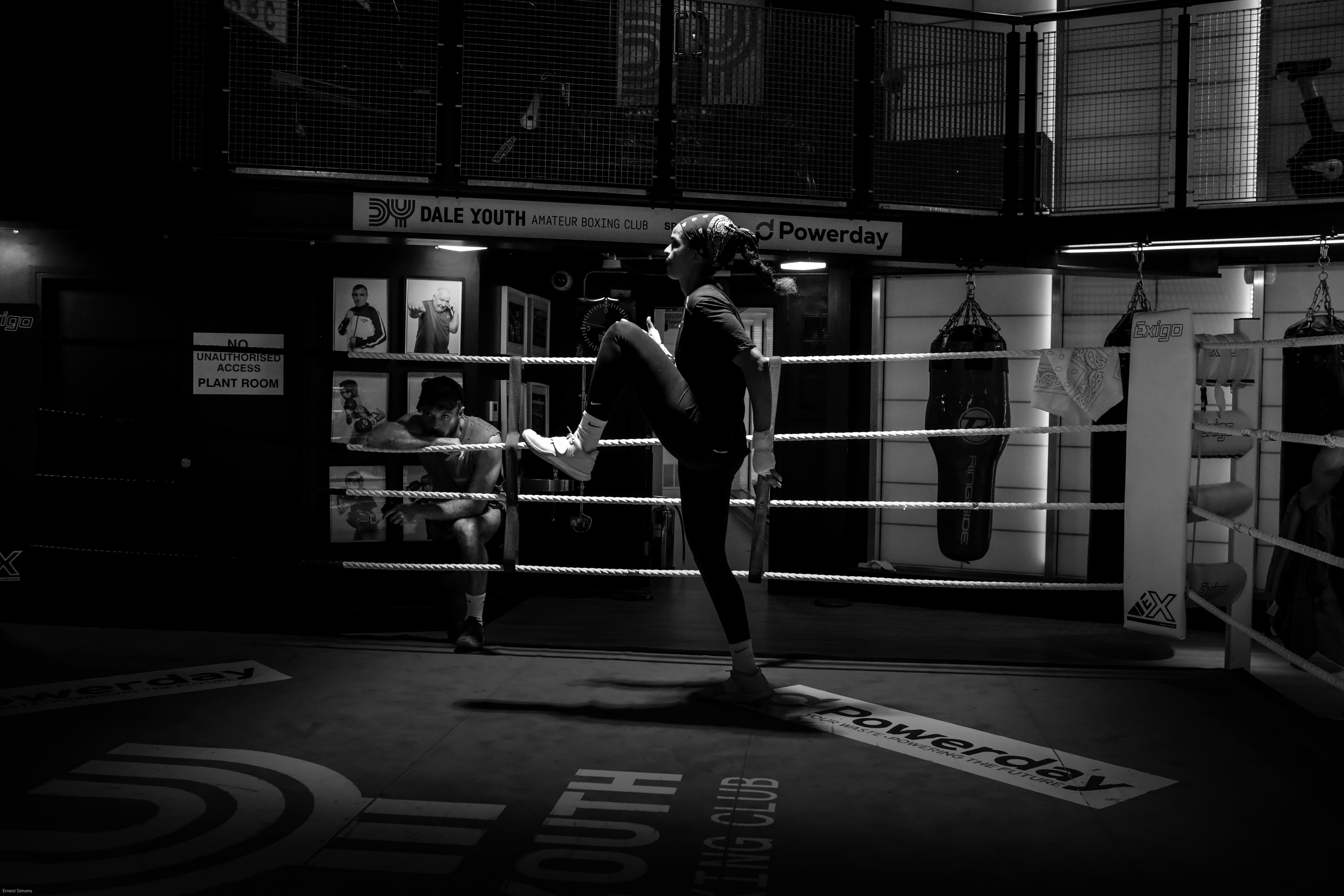 a female boxer in the ring who is from an ethnically diverse background