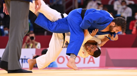 VI judo althete mid air at the Tokyo Paralympics