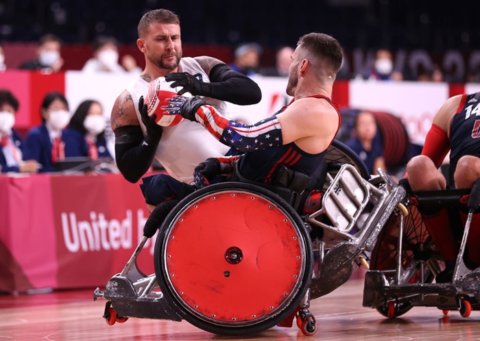 Stuart Robinson #3 of Team Great Britain competes for the ball with Joshua Wheeler #10 of Team United States during the gold medal wheelchair rugby match on day 5 of the Tokyo 2020 Paralympic Games at Yoyogi National Stadium on August 29, 2021 in Tokyo, Japan.