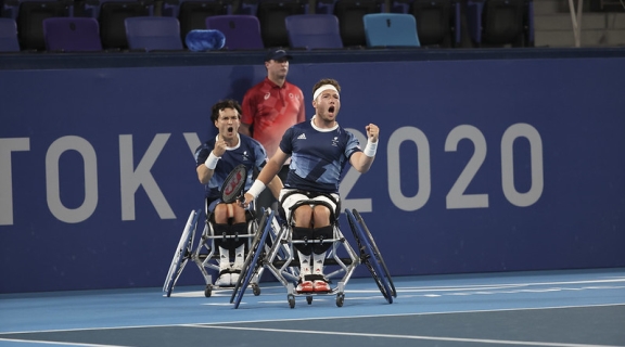 men's doubles celebrate a point in the wheelchair tennis at the Tokyo Paralympics